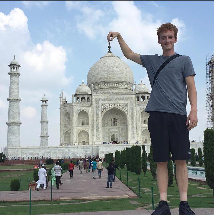 Josh Arnold during the furniture installation project in India